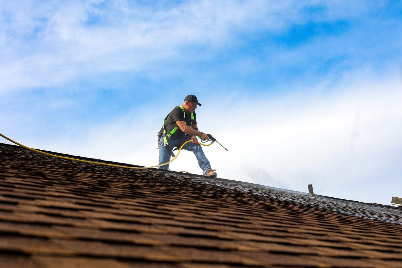 Shingle Serum treatment on a residential roof